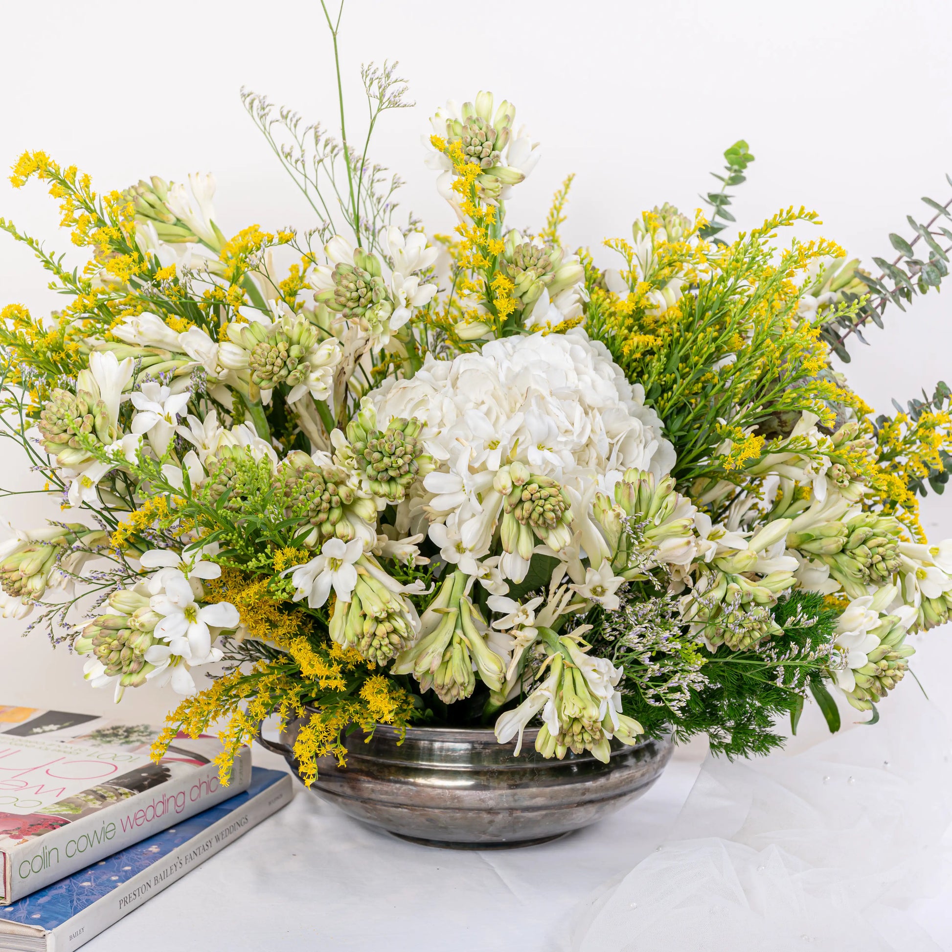 Alabaster premium white floral arrangement with white roses and lilies in elegant glass vase by House of Mograa