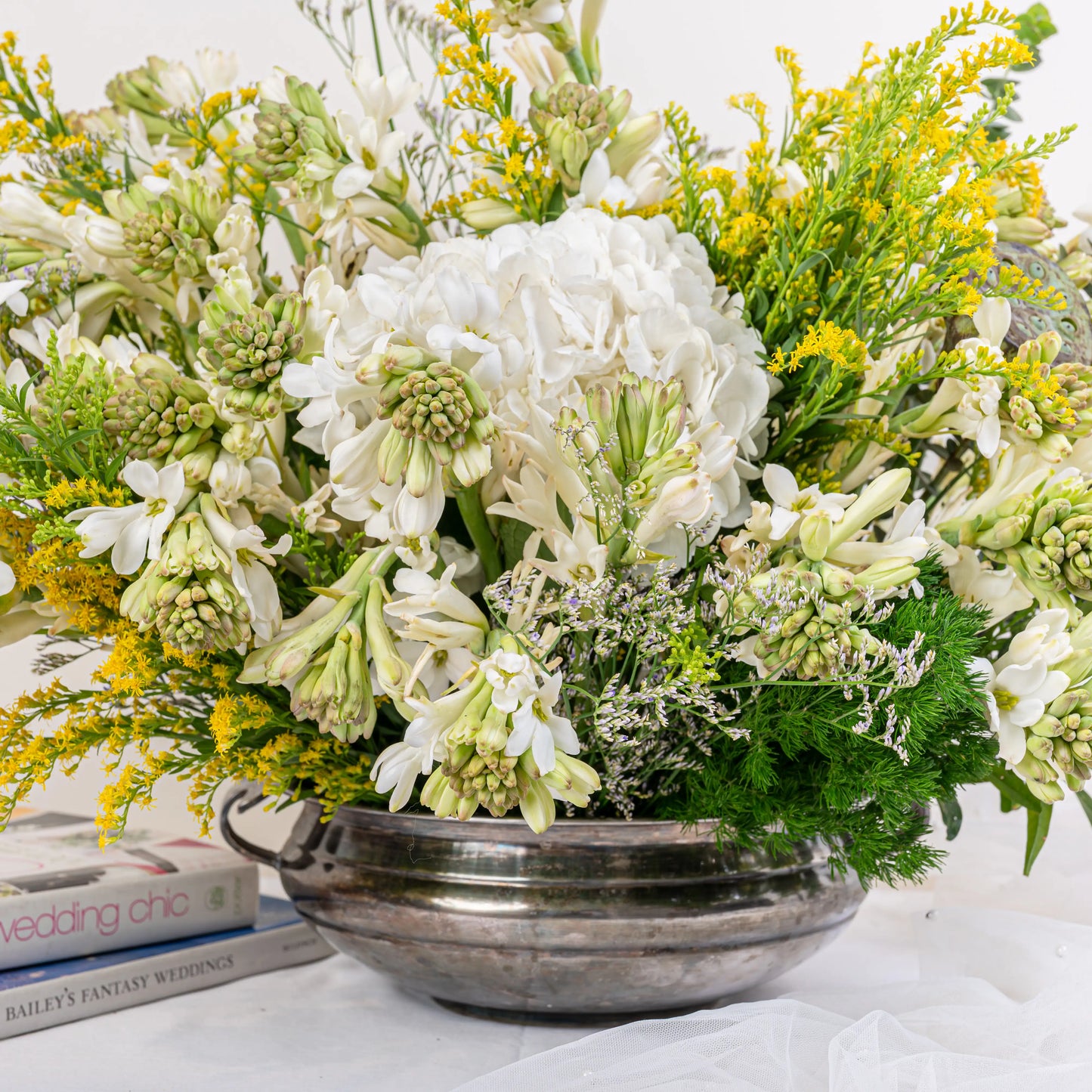 Alabaster premium white floral arrangement with white roses and lilies in elegant glass vase by House of Mograa