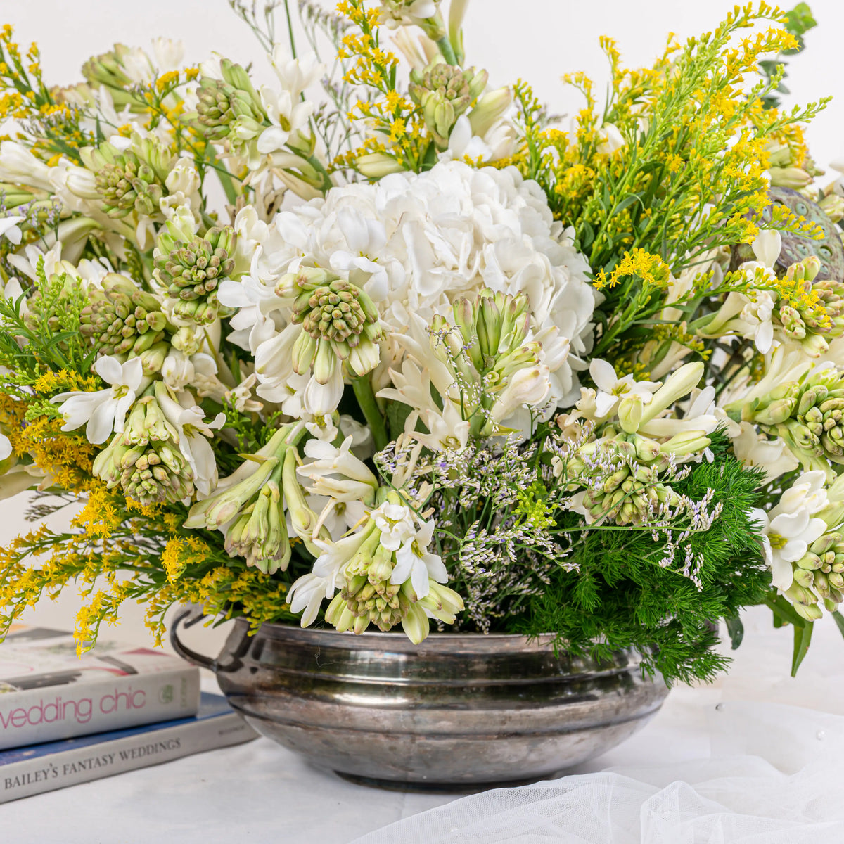 Alabaster premium white floral arrangement with white roses and lilies in elegant glass vase by House of Mograa