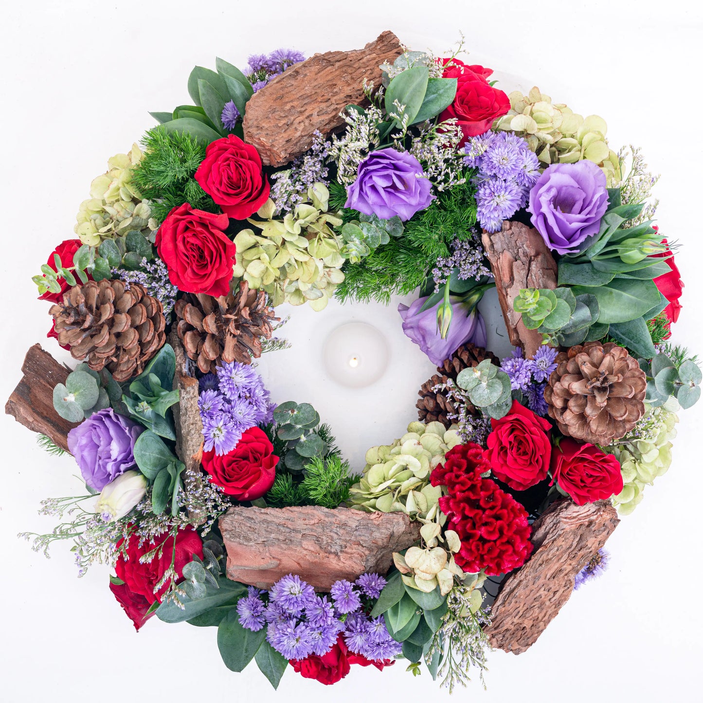 Amethyst Ember round red and purple floral arrangement with red roses and purple blooms in premium box by House of Mograa