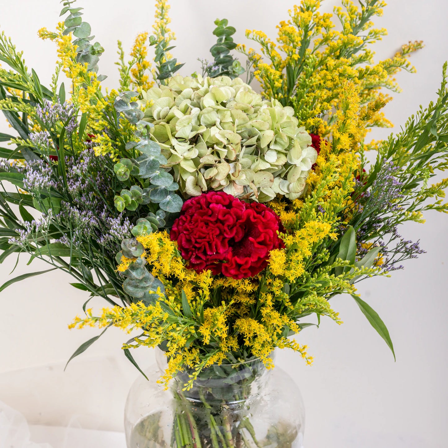 Argenté polished silver floral pot with mirror finish for luxury flower arrangements by House of Mograa