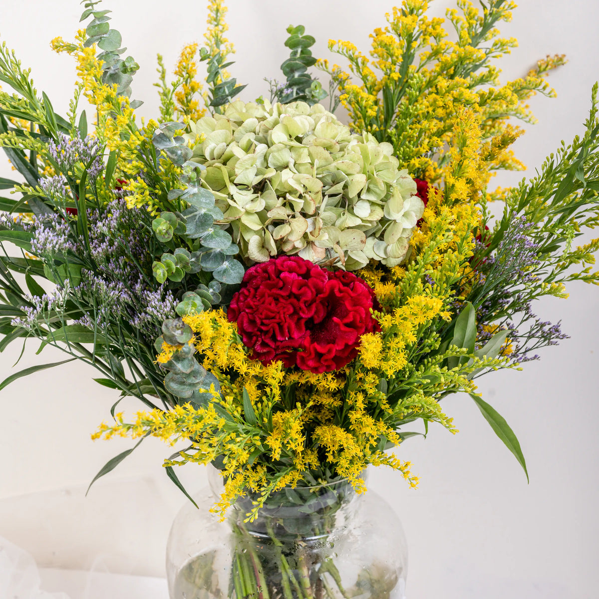 Argenté polished silver floral pot with mirror finish for luxury flower arrangements by House of Mograa