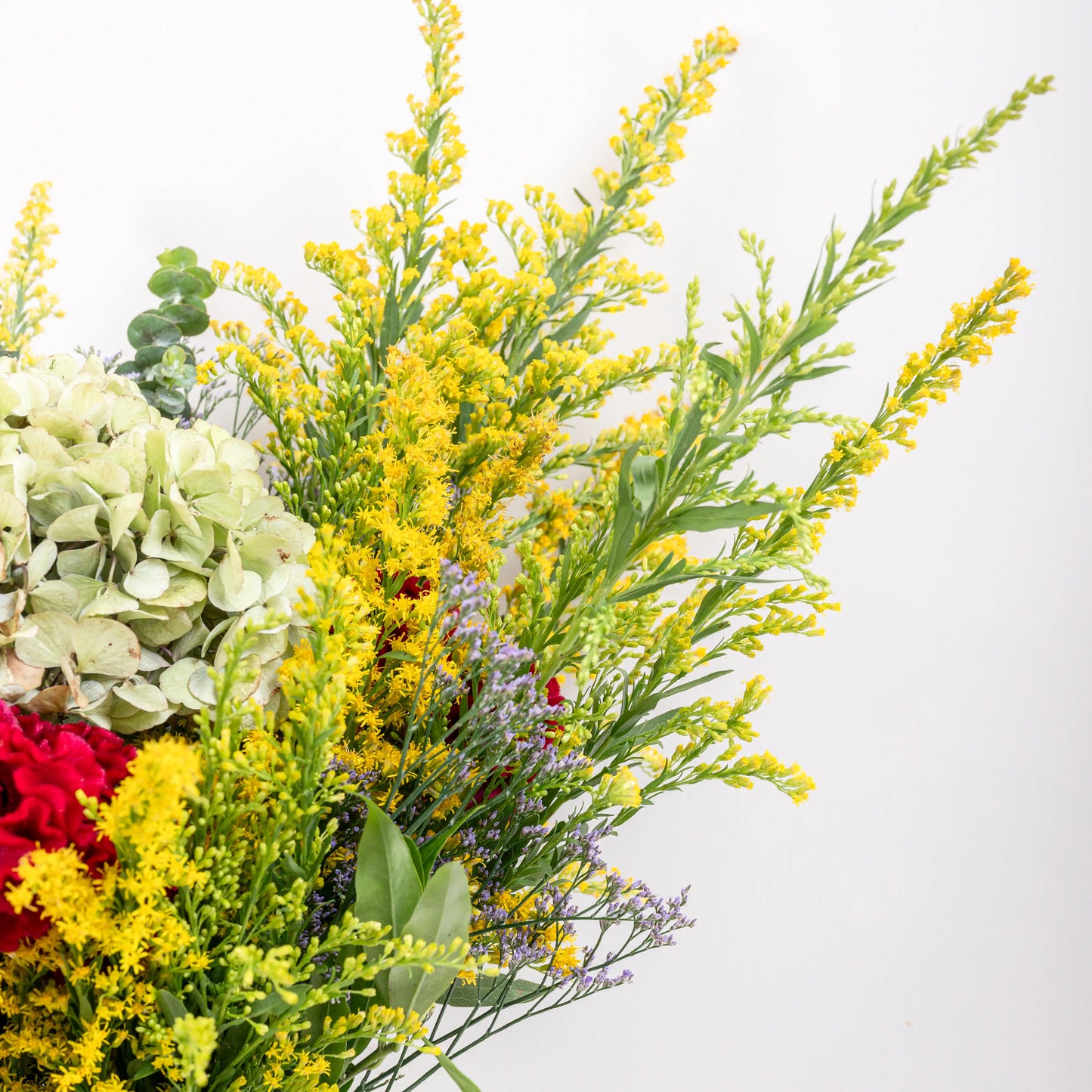 Argenté polished silver floral pot with mirror finish for luxury flower arrangements by House of Mograa